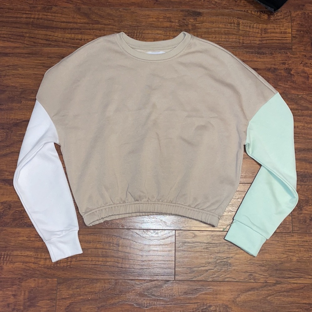 NWT Refuge Athletics Tan Sweater With One Teal Sleeve and One White Sleeve
